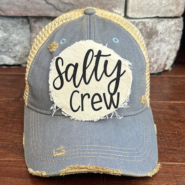 light blue cap with 'Salty Crew' patch