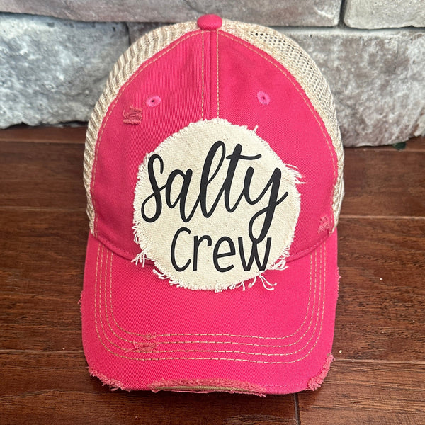 Pink cap with 'Salty Crew' logo 